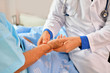 © S photographer - Concept of healing care, The doctor is healing  old woman.