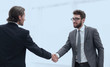 © ASDF - welcome and handshake of business partners