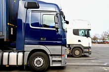 Lorries Parked Up Outside A Company's Car Parking Area Ready To Deliver Goods To Customers Stock Photo