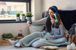 © lordn - Girls having fun at home, listening music over smart phone. Family quality time