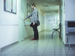 © Mihail - man patient in the hospital enter the room to visit doctor