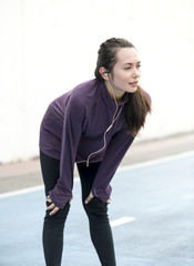 Wall Mural - White woman stretching before exercise