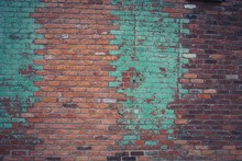 Red Brick Wall With Turquoise Paint