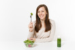 © ViDi Studio - Woman sitting at table with green detox smoothies, salad in glass bowl, fork isolated on white background. Proper nutrition, vegetarian food, healthy lifestyle, dieting concept. Area with copy space.