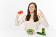 © ViDi Studio - Woman at table with green detox smoothies, fresh salad in glass bowl, tomato, cucumber isolated on white background. Proper nutrition, vegetarian food, healthy lifestyle, dieting concept. Copy space.