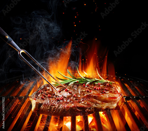 Cuadros en Lienzo Entrecote Beef Steak On Grill With Rosemary Pepper And Salt