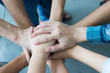 © Thammasiri - Team work concept. Business people joining hands