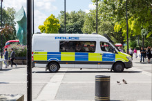 Metropolitan Police Van With Police Officer Inside At Marble Arch, London