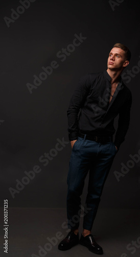 black shirt with navy blue pants