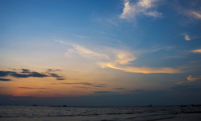 Wall Mural - sunset with soft blue sky background