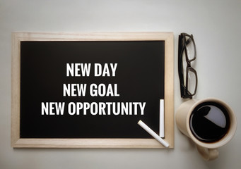 motivational and inspirational quotes - new day, new goal, new opportunity . with vintage styled bac