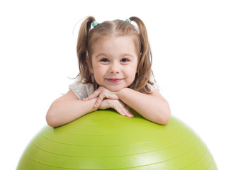 Happy sportive child playing with fitness ball isolated on white background