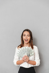 Wall Mural - Portrait of a happy young business woman