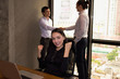 © S photographer - Youngs is working in office building background