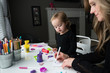 © Sarah Rypma - Mother and daughter drawing with colored markers