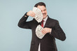 © khosrork - Businessman hides behind fans out of money