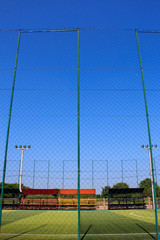 Wall Mural - Soccer field with artificial turf in a stadium,Mae-Hia Public's football field ,Chiang Mai Thailand