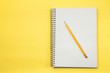 © papii - Study note book with yellow pencil