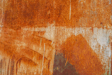 Wall Mural - painted iron surface with a large rusty and metal corrosion, old background with peeling and cracking paint as background, orange texture