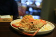 © suebsiri - grilled river prawn on white ceramic plate. with spaghetti shrimp egg. seafood plate restuarant dinning.