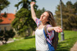 © djoronimo - Happy young woman is enjoying sunny day.