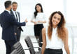 © ASDF - business woman on the background of business team