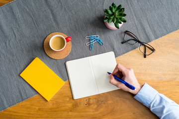 Wall Mural - Empty notebook with copy space and hand as flat lay and template
