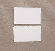 © fontgraf - Mockup of white business cards at beige background