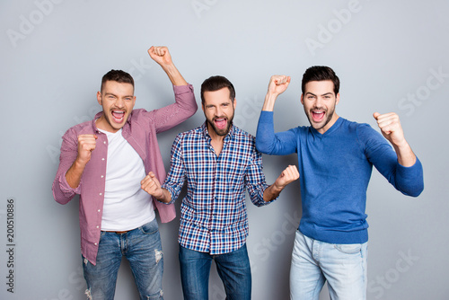 Portrait Of Cheerful Crazy Funny Comic Guys In Denim