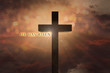 heavenly scene with Jesus Christ wooden cross elevated on the sky and He has risen text on a sunset background with warm, orange colors, dramatic light, clouds.Easter, resurrection, faith concept. 