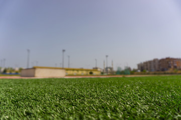 Close low angle view of pitch in urban stadium