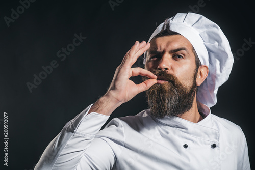 Fotografía Serious bearded chef, cook or baker gesturing excellent