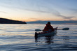© edb3_16 - Ocean Kayaking during Sunset. Taken in Vancouver, British Columbia, Canada. Concept: sport, adventure, fitness, vacation, holiday.
