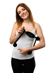 Poster - Happy beautiful young girl with weighing machine