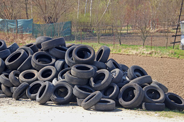 Jaslo/Yaslo, Poland - april 12, 2018: Sweet rubber tires for various cars, trucks and tractors. Technology of automotive industry. Recycling of consumables. Preparation for the season. Car repair shop