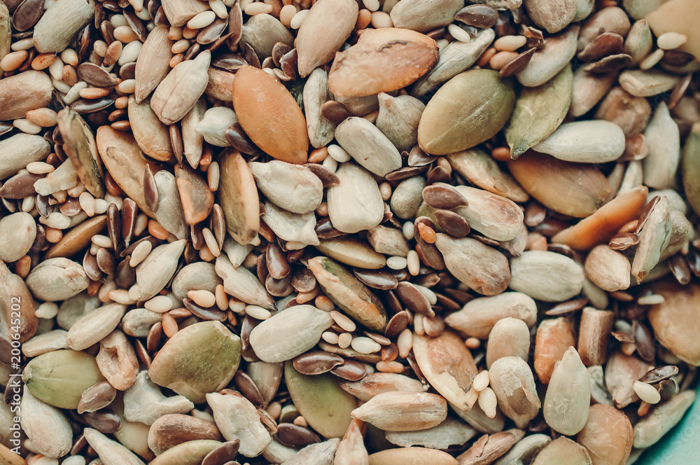 background of various seeds and nuts - obrazy, fototapety, plakaty 