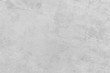 © mxbfilms - Light grey concrete wall texture. Cement texture. Design background.