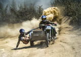 Fototapeta Konie - motocross motorbike with sidecar motorcycle trailer dust dirt