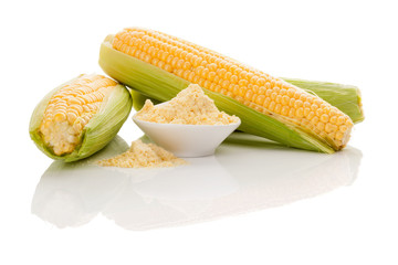 Wall Mural - Corn flour in bowl with fresh corn cobs.