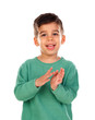 © Gelpi - Gipsy child with green t-shirt clapping