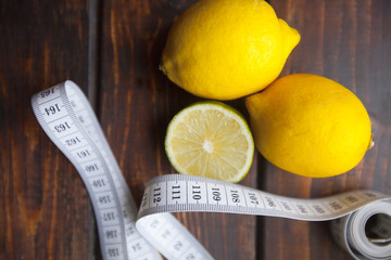 Diet food ingredients on dark wooden background