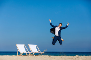 Wall Mural - Man relaxing on beach