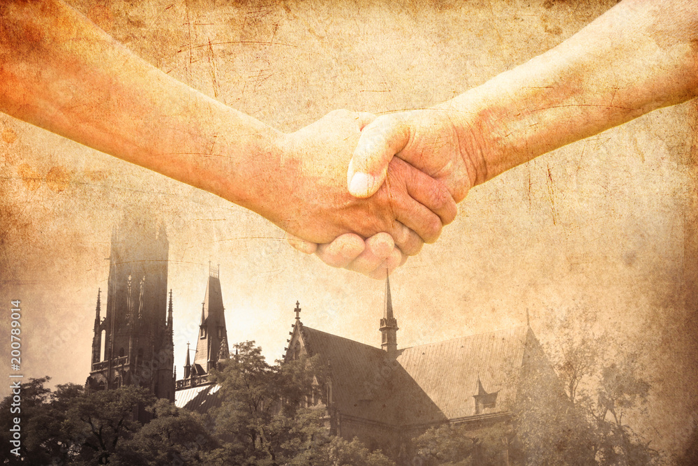 handshake of two conflict people with Church on background - obrazy, fototapety, plakaty 