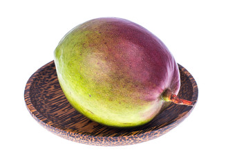 One ripe mango on plate