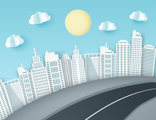 Wall Mural - Paper art background with city view. Fluffy paper clouds, road, scyscrapers. Trendy origami paper cut style. Vector illustration