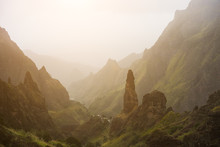 Mountain Silhouette Of Picturesque Canyon Ribeira Da Torre Covered With Sand Dust Brought From Sahara. Sugarcane, Coffee And Other Cultivation Grow On Steep Terraced Hills. Santo Antao Cape Verde