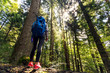 © Novak - Low angle view of female hiker outdoor
