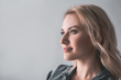 © Yakobchuk Olena - Profile of pensive woman with blonde hair looking aside. Copy space in left side. Isolated on background