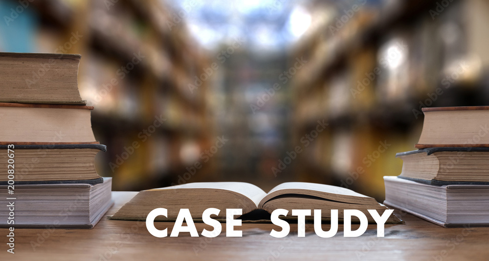 CASE STUDY CONCEPT Book in library with old ollege students studying ...