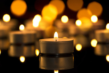 Burning candles with shallow depth of field